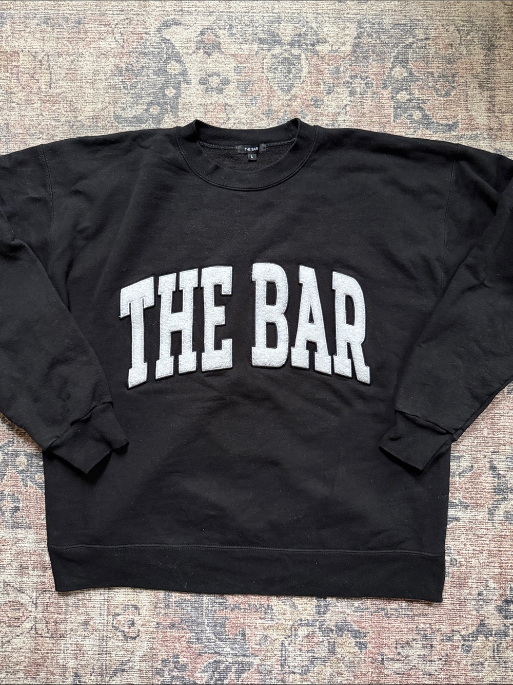 Black 'THE BAR' Crewneck Arlo Sweatshirt, Teddy white lettering, size L